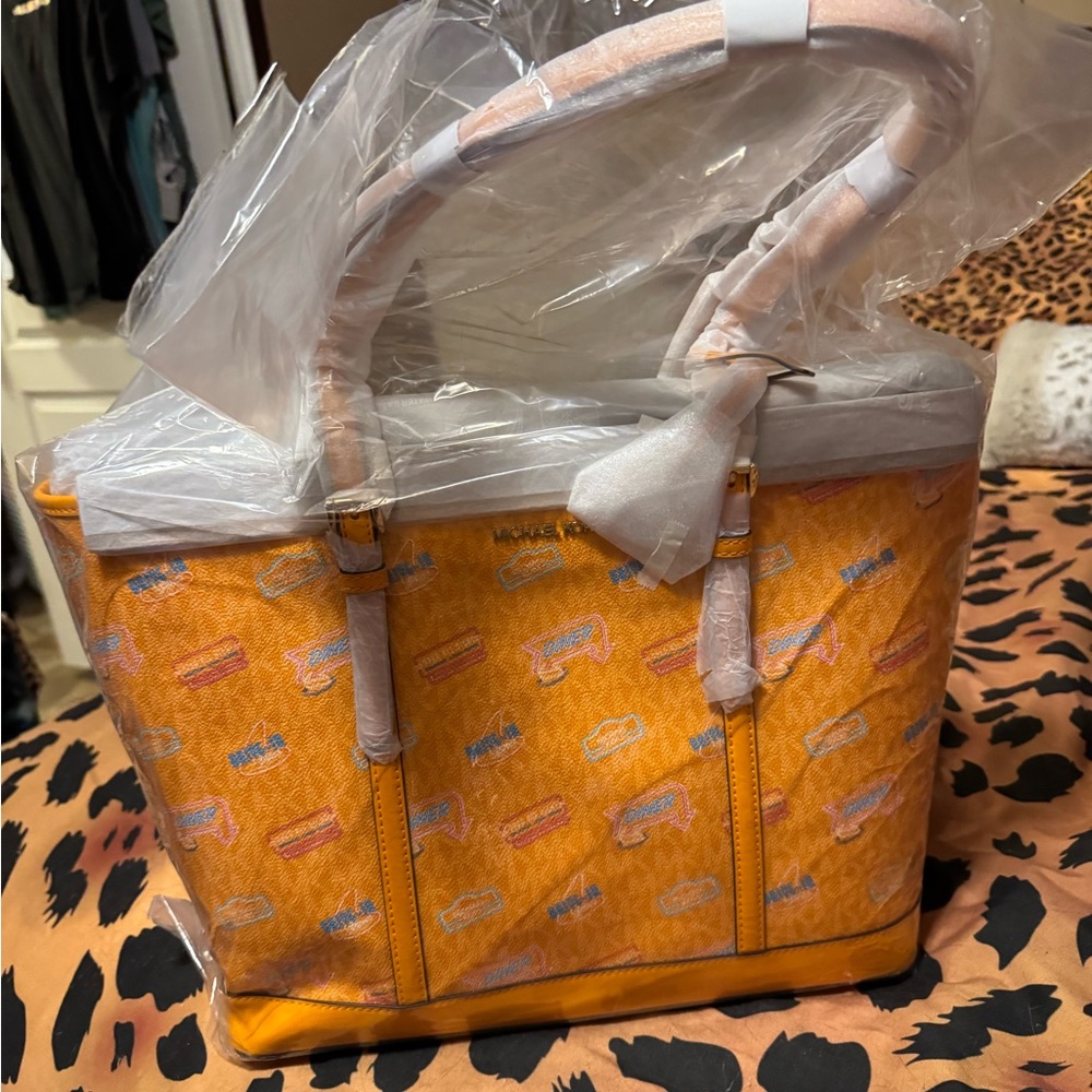 Michael Kors new Orange Patterned Logo Large Tote with Top Handles